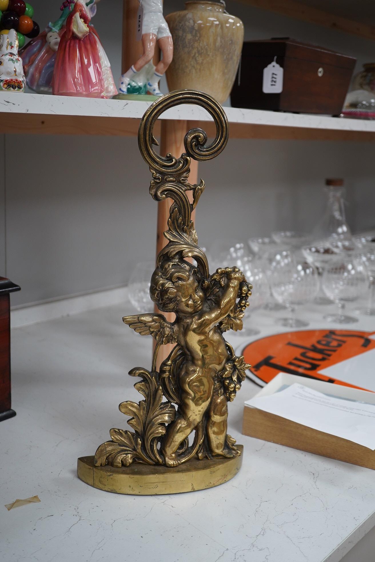 A Victorian style brass cherubic doorstop, 49cm high. Condition - some scratches to base.